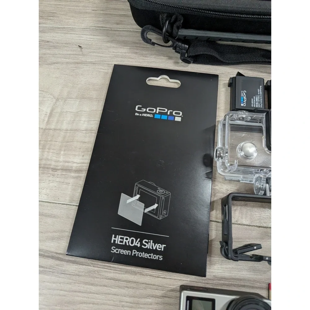 GoPro Hero 4 Silver Edition- with Accessories and Case Included